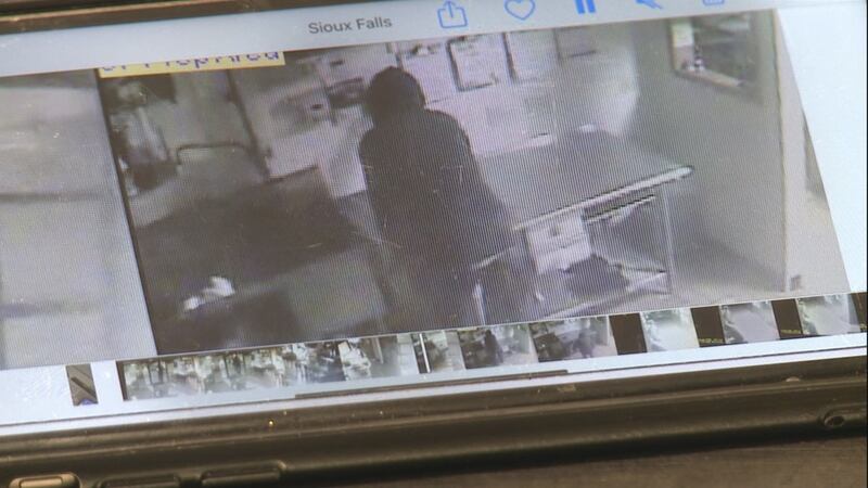 Surveillance video catches a robber inside a Sioux Falls Subway store