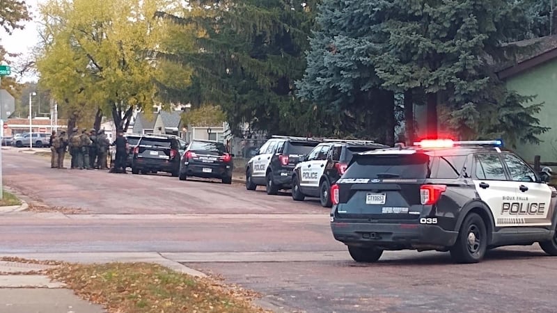 Sioux Falls Police and SWAT have responded to a situation at a central Sioux Falls house.