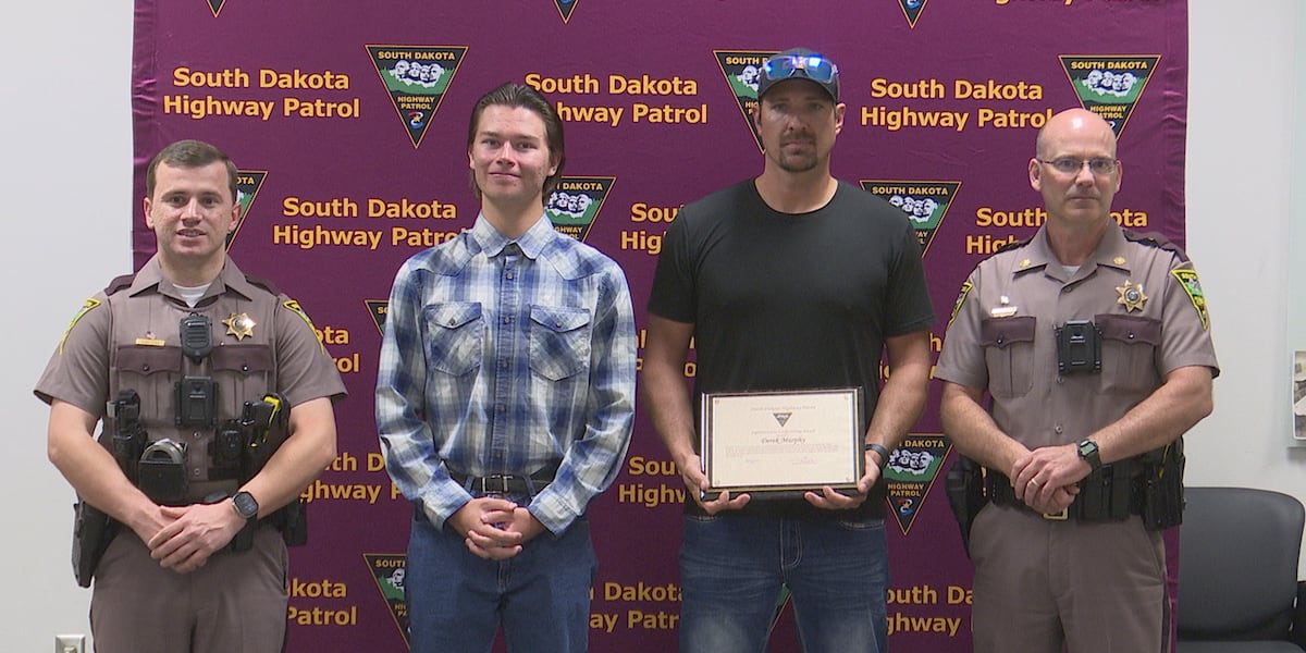 Two men honored for saving driver from a fiery crash