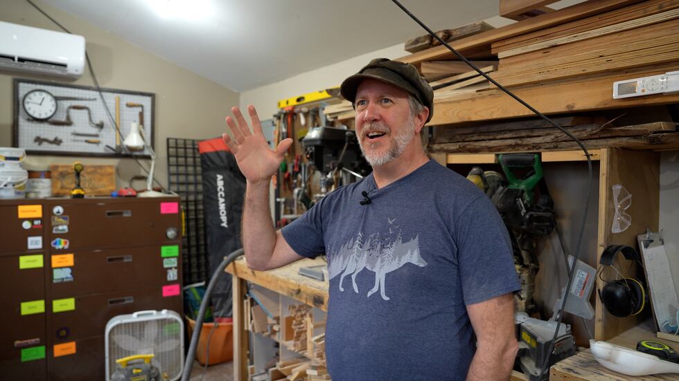 Josh Reuter explains his woodworking process in his workshop in Rapid City, S.D. on Feb. 3, 2025.