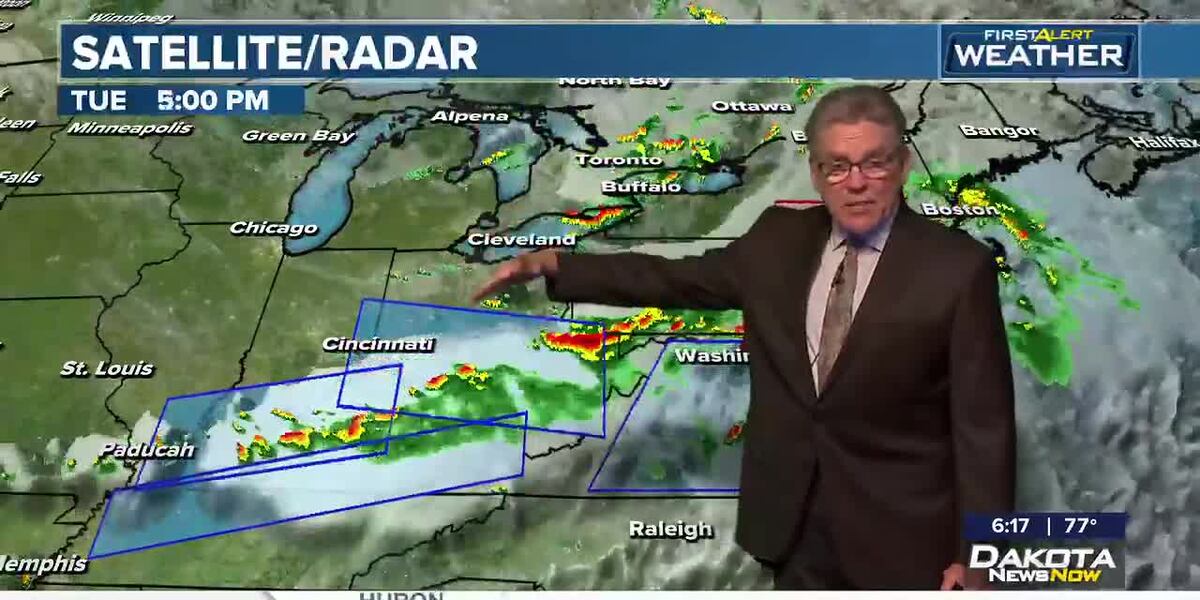 Cooler with a few showers today and Thursday before the heat returns