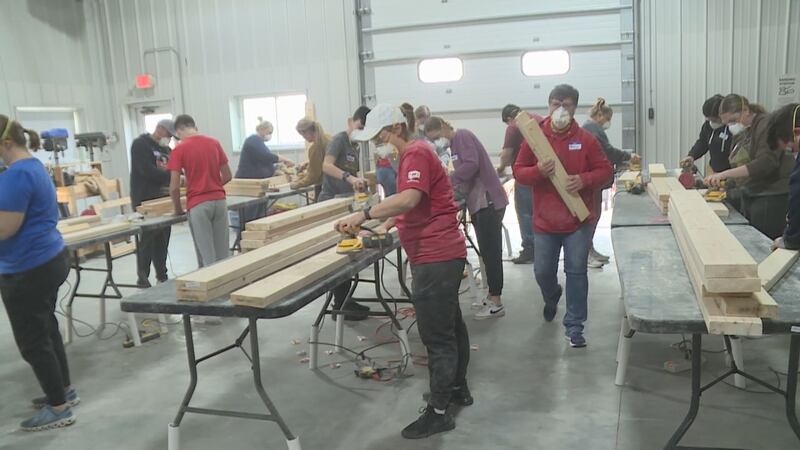 USD med students build beds for kids in need